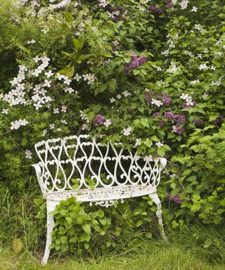 White antique garden seat
