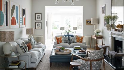 Neutral living room with color and pattern in Victorian house in London