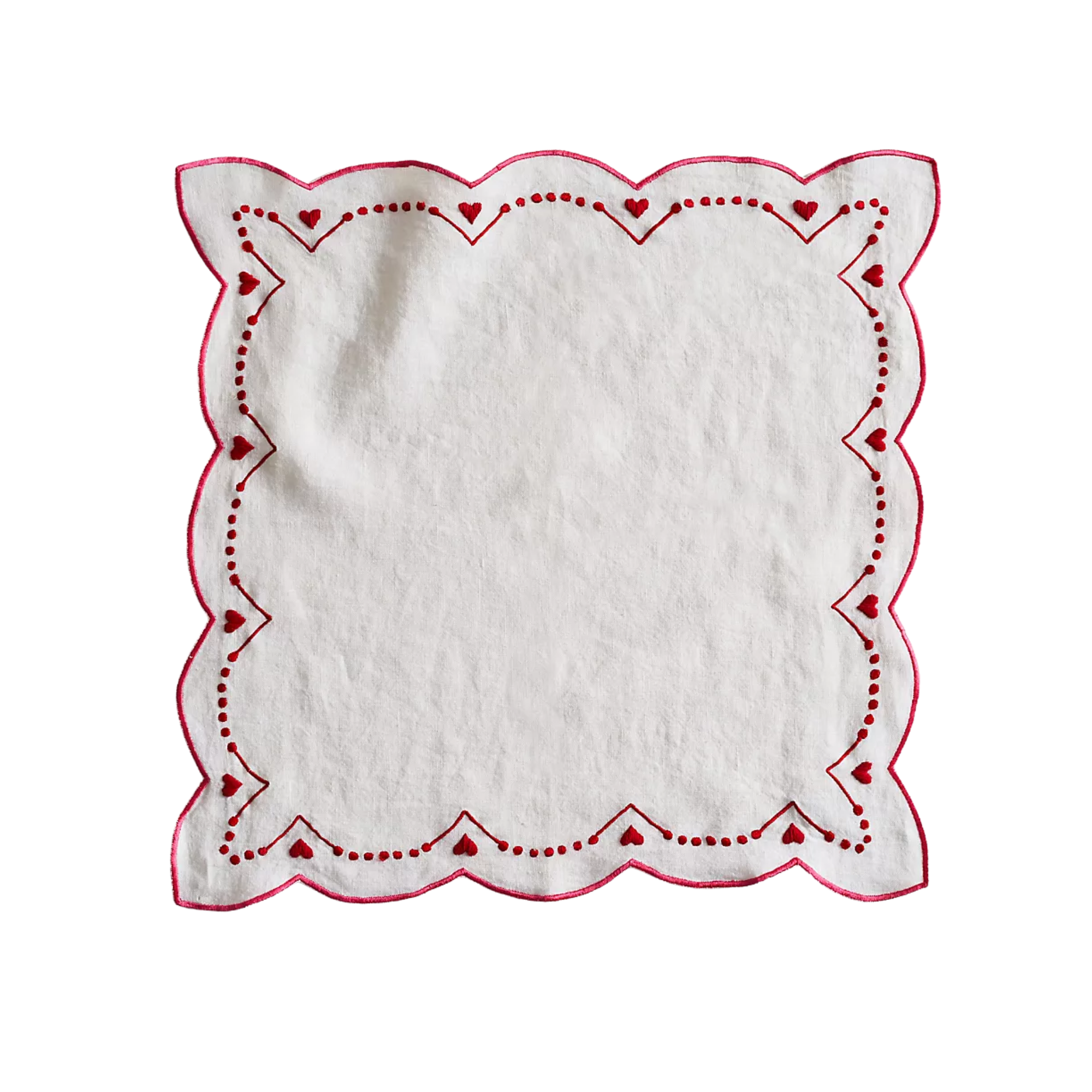 a white napkin with heart embroidery