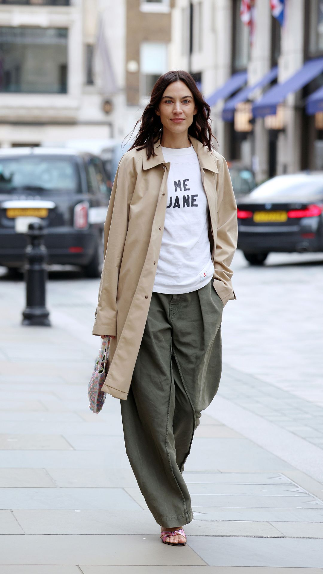 ALEXA CHUNG WEARING A BURBERRY TRENCH AND BARREL LEG TROUSERS
