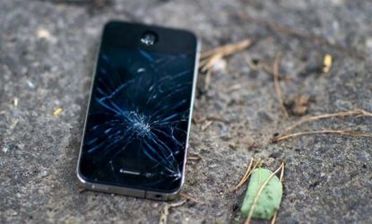 An out-of-work iPhone is kicked to the curb.