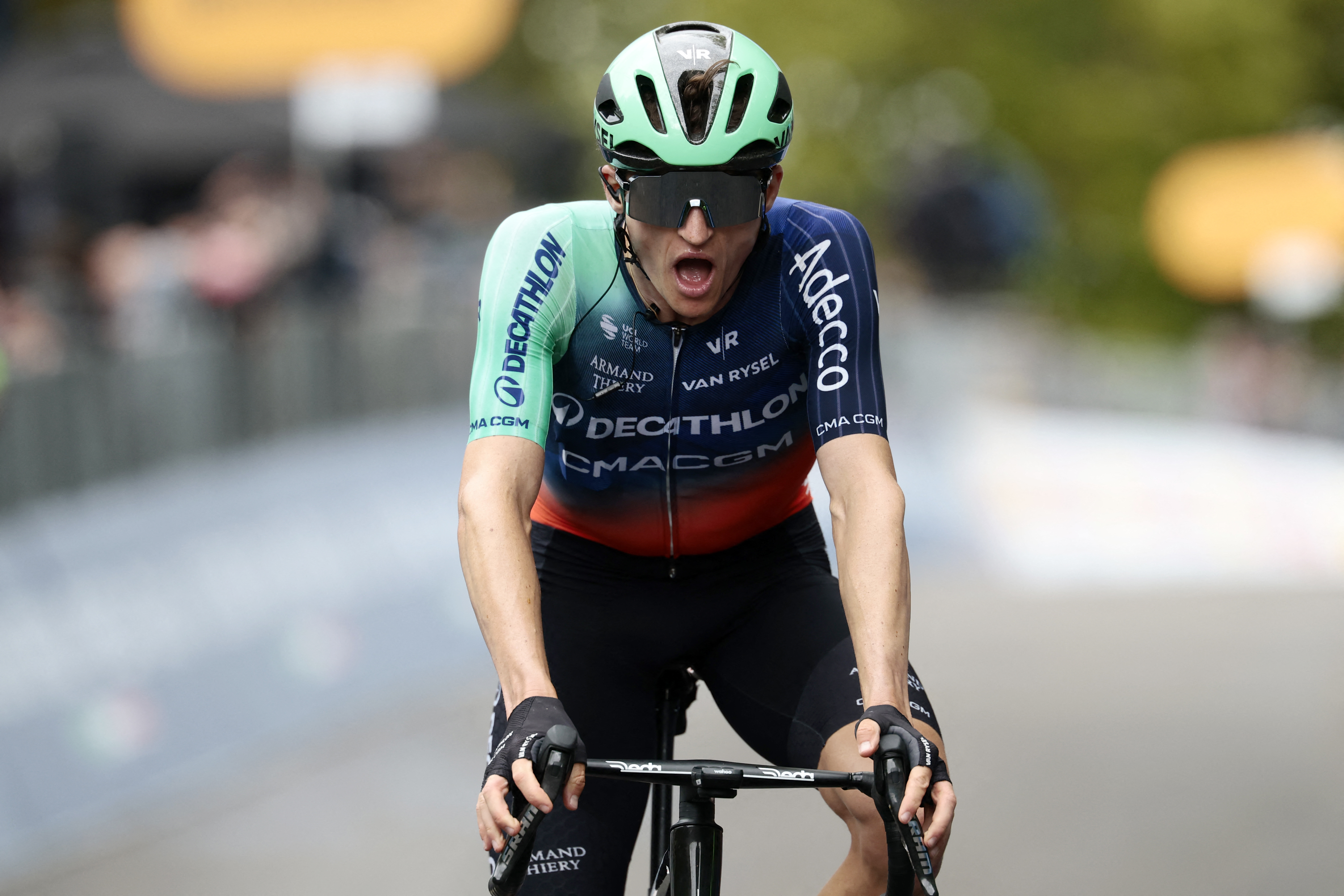 Decathlon CMA CGM Team Austrian rider Felix Gall crosses the finish line to finish second at the end of the 9th stage of the Giro d'Italia 2026 - Tour of Italy cycling race between Cervia and Corno alle Scale, near Doganaccia, central Italy on May 17, 2026. (Photo by Luca Bettini / AFP)