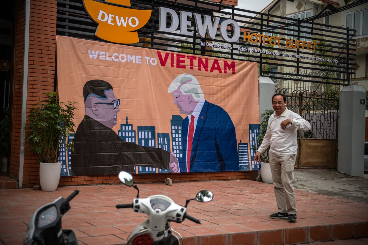 A sign showing Trump and Kim in Vietnam