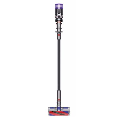 Dyson Micro 1.5kg standing against a wall
