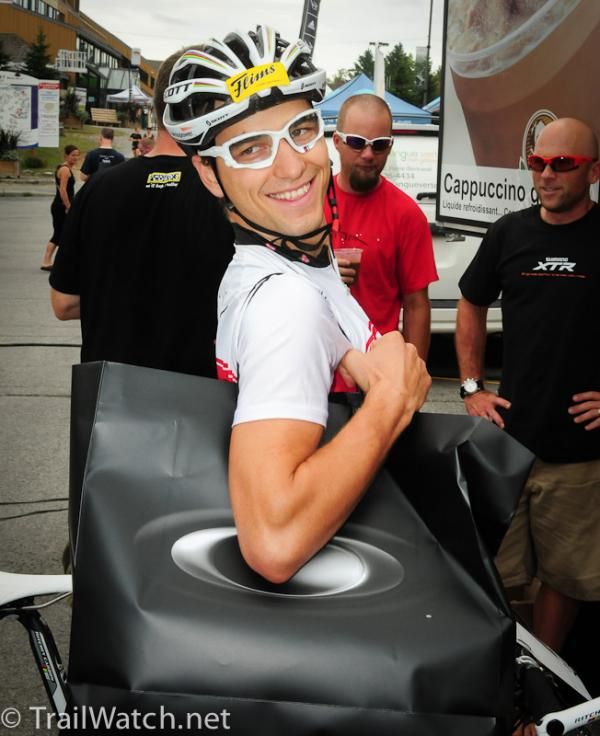 World Champion Nino Schurter (Switzerland) looks like a mall shopper with his Oakley bag.