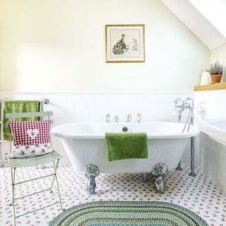 country style attic bathroom with white bathtub