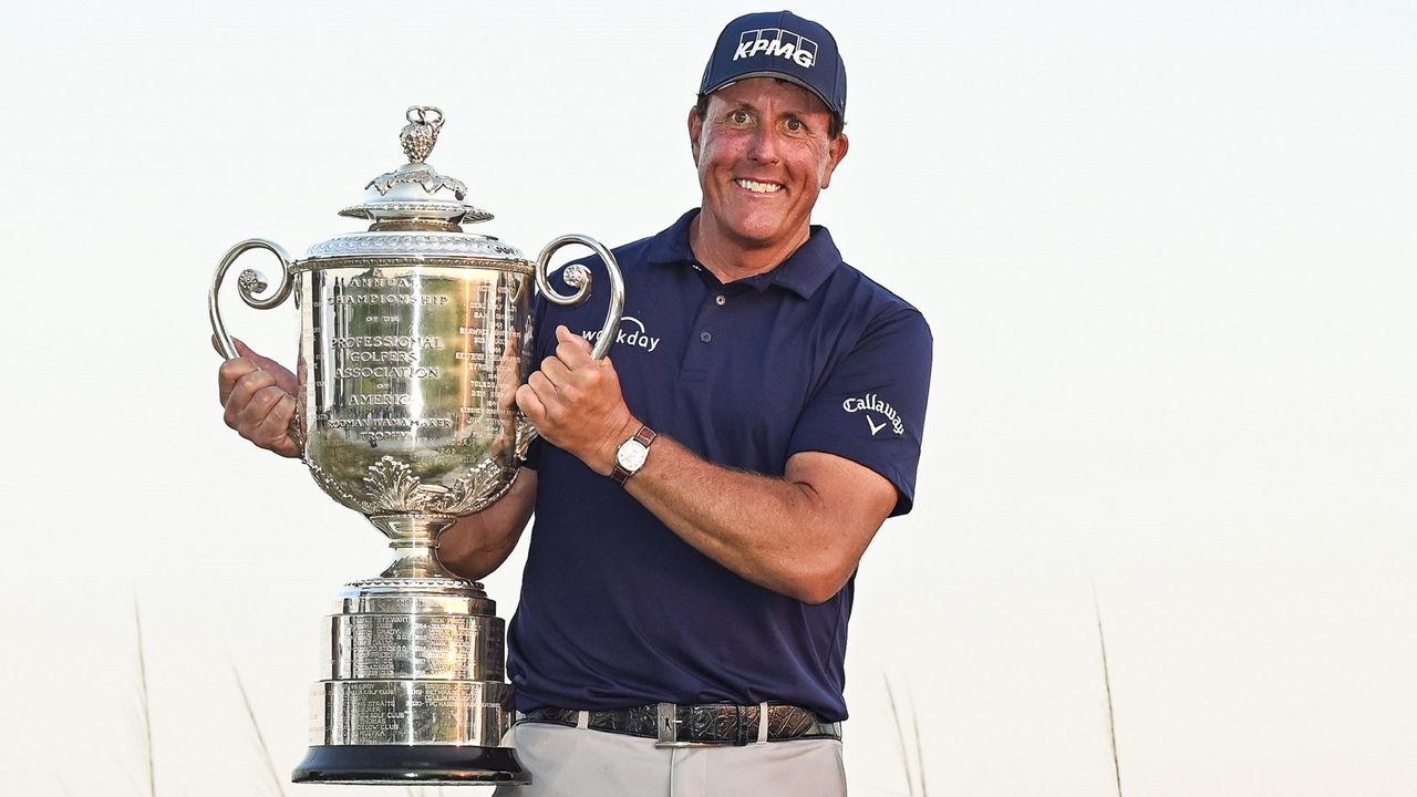 Phil Mickelson holds the Wanamaker Trophy after winning the 2021 PGA Championship