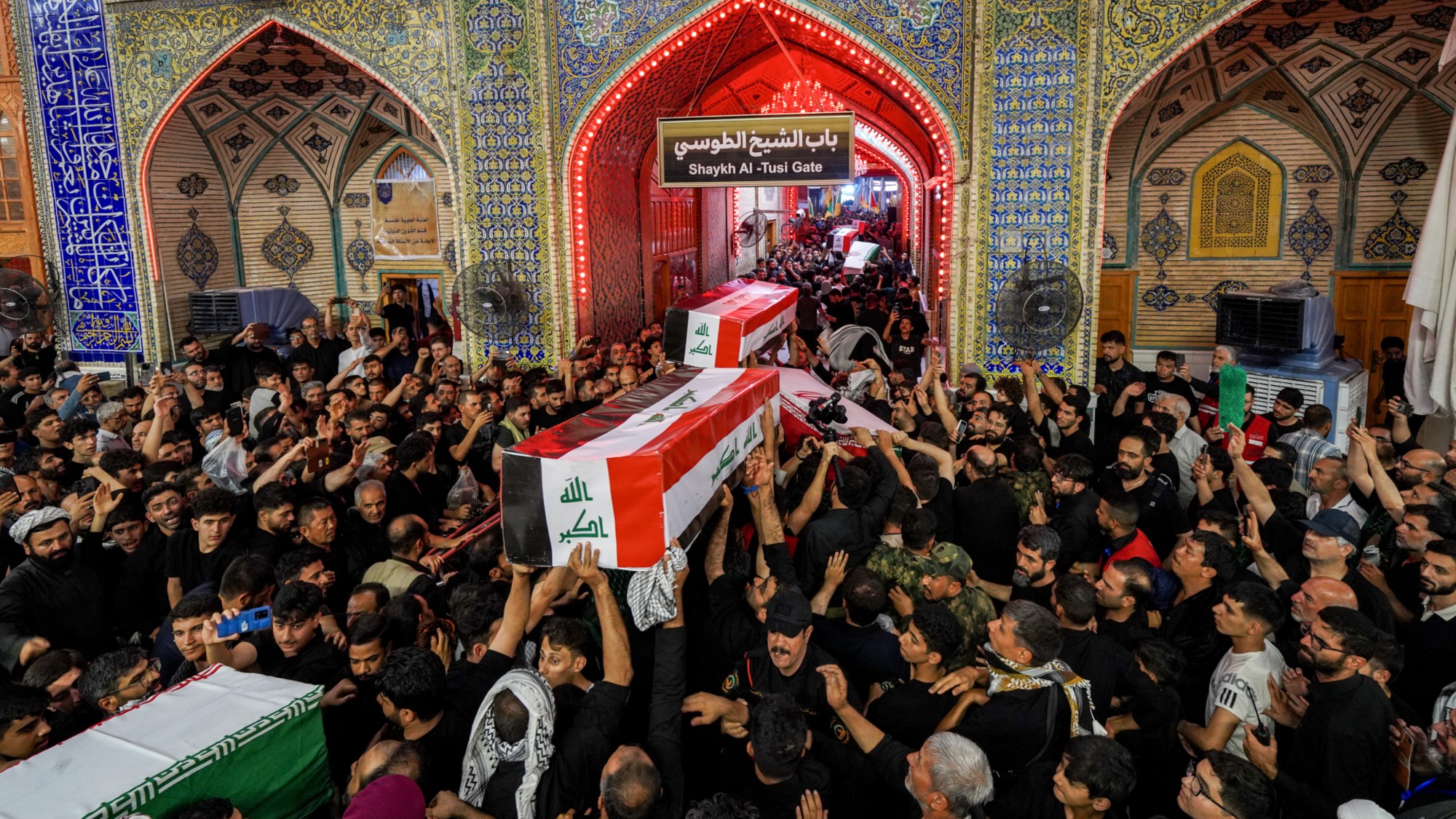 A funeral ceremony is held for members of Iraq's Popular Mobilization Forces and Iran's Islamic Revolutionary Guard Corps who were killed in airstrikes carried out by the U.S. and Saudi Arabia