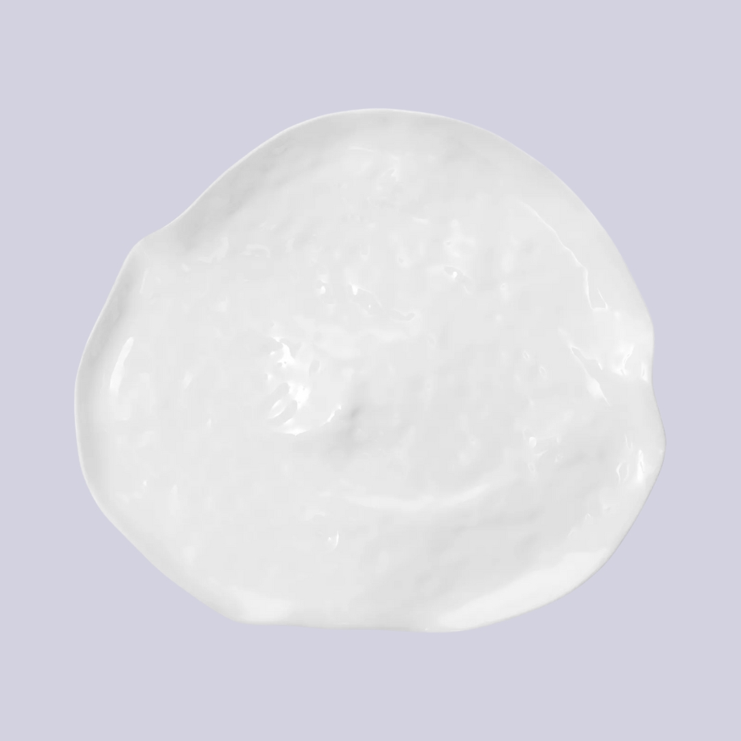 SERAXPerfect Imperfections Ebb and Flow bone china large plate 34cm against pale purple background.
