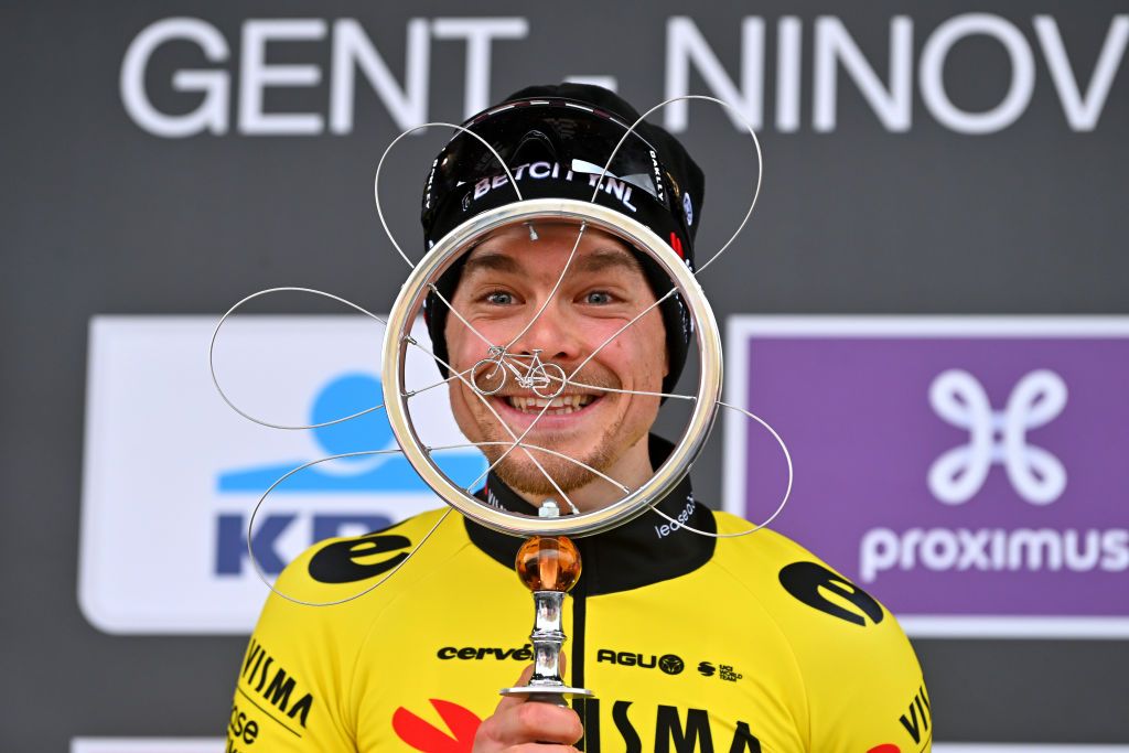 Jan Tratnik won the 2024 Omloop Het Nieuwsblad and celebrated on the podium