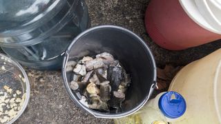 camping bucket ideas: chopped up fish in a bucket