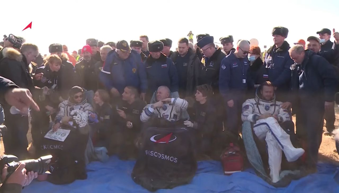 Russian actress Yulia Peresild (left), cosmonaut Oleg Novitskiy (center) and director Klim Shipenko are welcomed back to Earth after their successful Soyuz capsule landing on the steppes of Kazakhstan on Oct. 17, 2021.