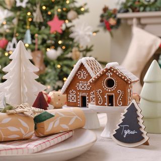 Christmas tablescape with a gingerbread house