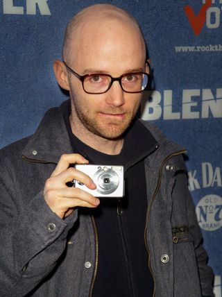 Moby at a Grammy party in 2003 with compact camera