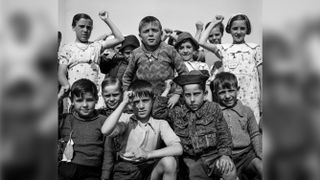 Black and white photograph of a group of children