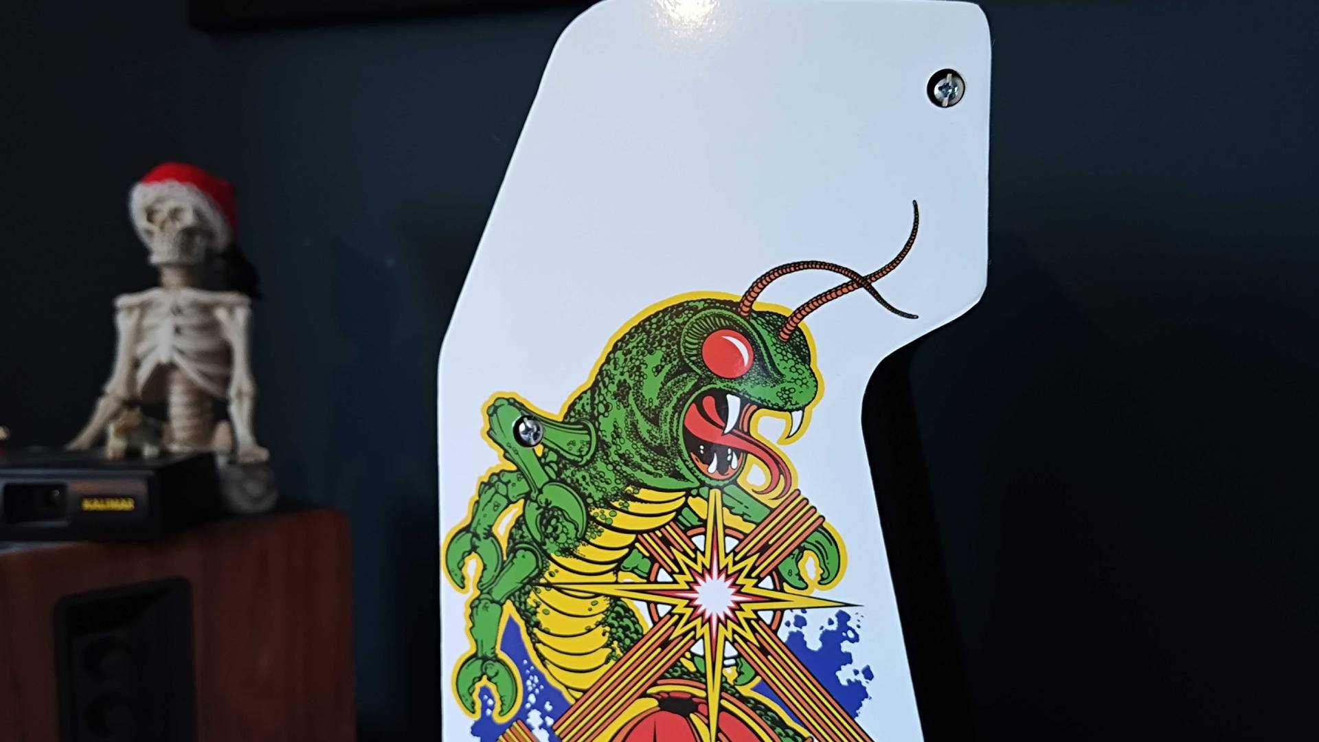 Close up of Centipede on side of Arcade Classic machine.