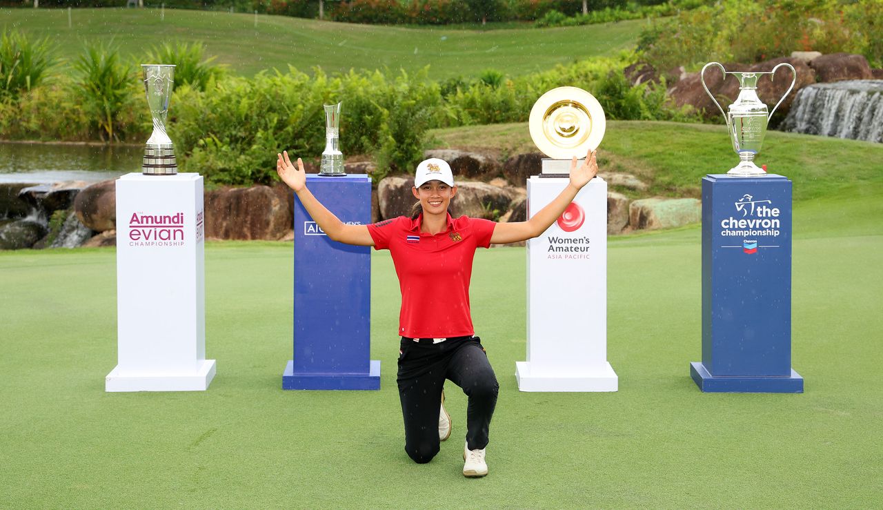 Eila Galitsky poses in front of the Major trophies