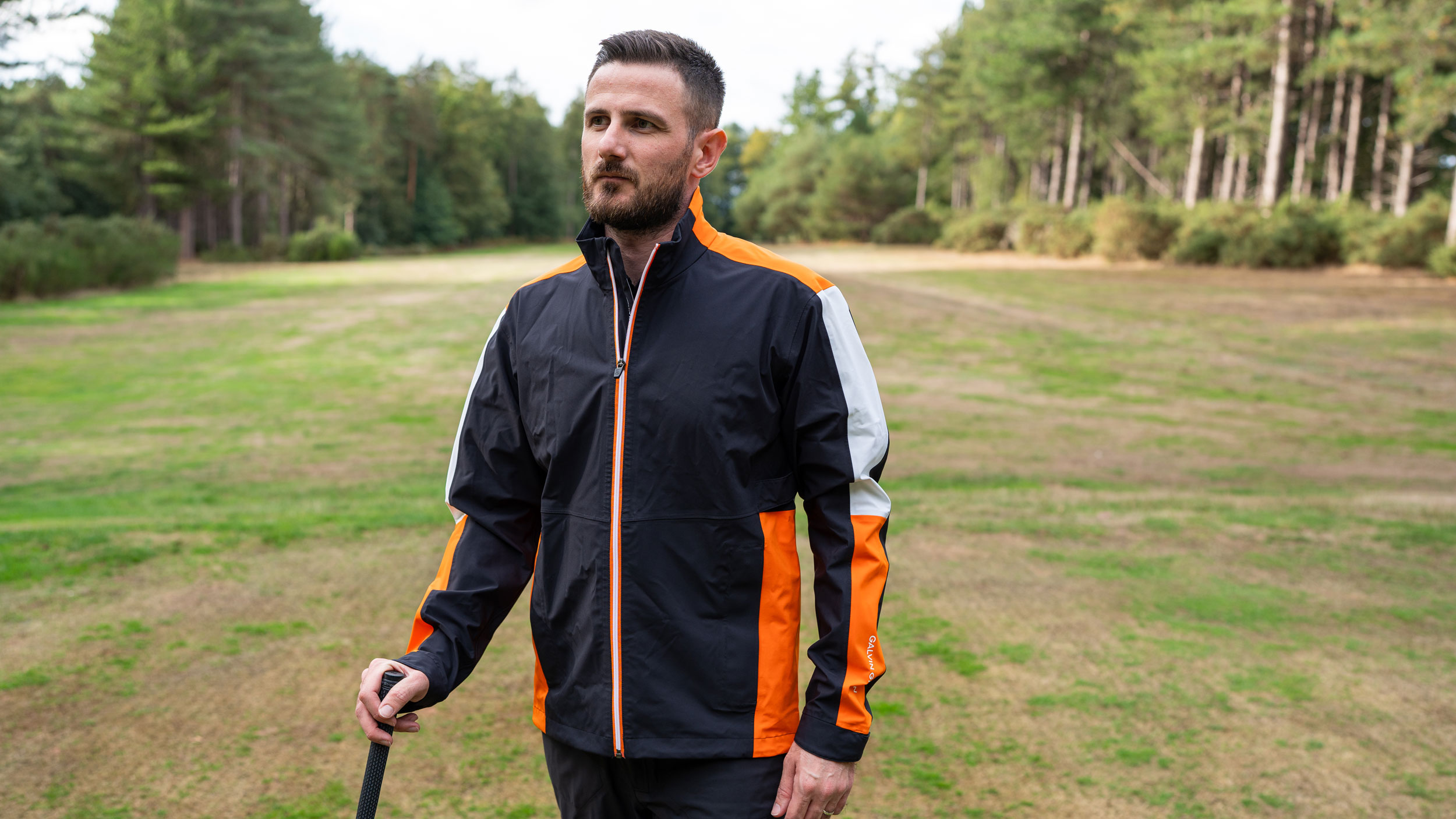 Baz Plummer testing the Galvin Green Arlo waterproof Jacket on the course