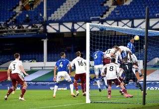 Yerry Mina (right) heads the winner