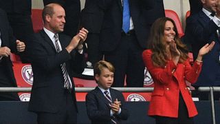 Prince William, Prince George and Catherine, Princess of Wales celebrate the first goal in the UEFA EURO 2020 round of 16 football match