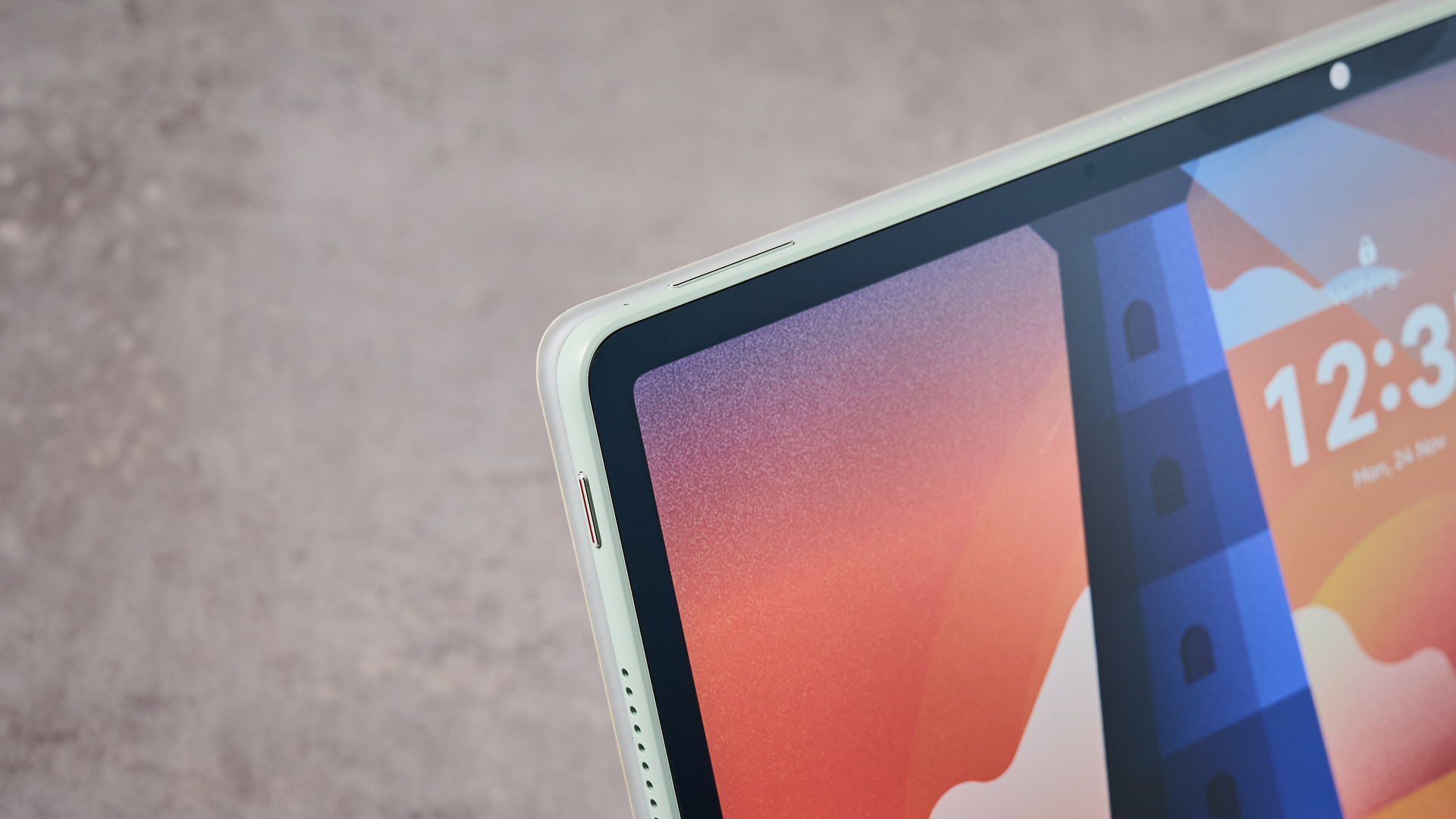 A closeup of the Huawei MatePad 12X 2025's top corner, showing both the volume buttons and lock button.