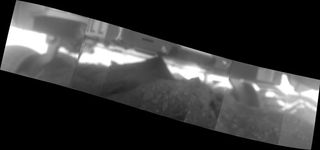 Panorama of images from Mars rover Spirit as engineers plan to extract the rover from soft martian soil