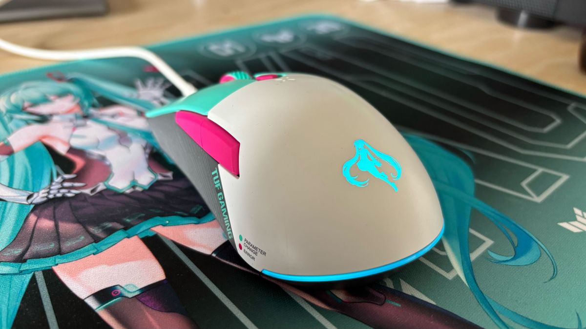 Miku x TUF Gaming mouse plugged in with blue Hatsune Miku icon lit up against TUF Gaming mouse mat
