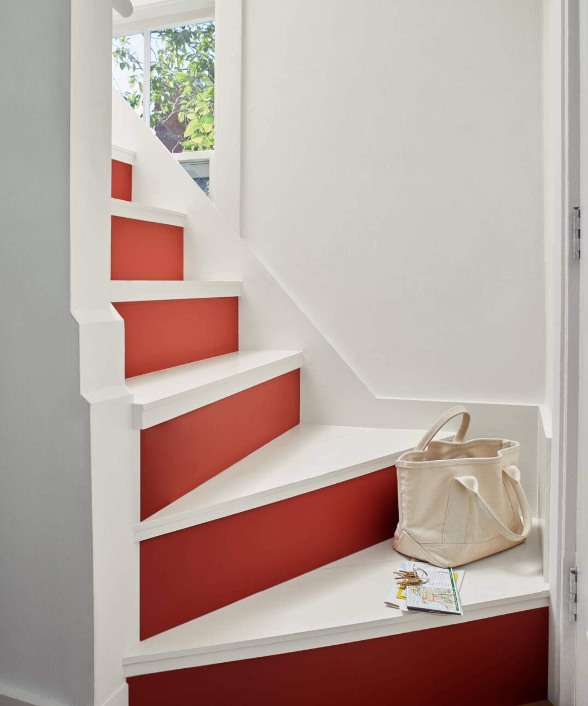 staircase with risers painted red, treads painted white