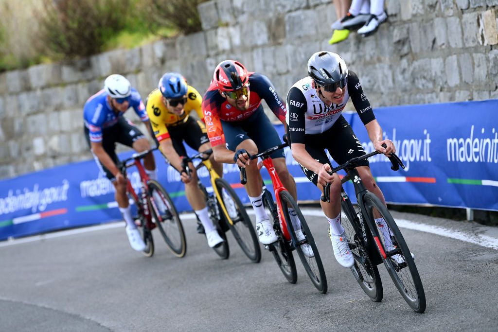 SANREMO ITALY MARCH 18 LR Mathieu Van Der Poel of The Netherlands and Team AlpecinDeceuninck Wout Van Aert of Belgium and Team Jumbo Visma Filippo Ganna of Italy and Team INEOS Grenadiers and Tadej Pogacar of Slovenia and UAE Team Emirates compete in the breakaway in the Poggio di Sanremo during the 114th MilanoSanremo 2023 a 294km one day race from Abbiategrasso to Sanremo MilanoSanremo UCIWT on March 18 2023 in Sanremo Italy Photo by Tim de WaeleGetty Images