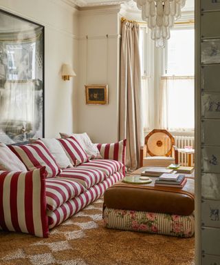 living room with red sofa