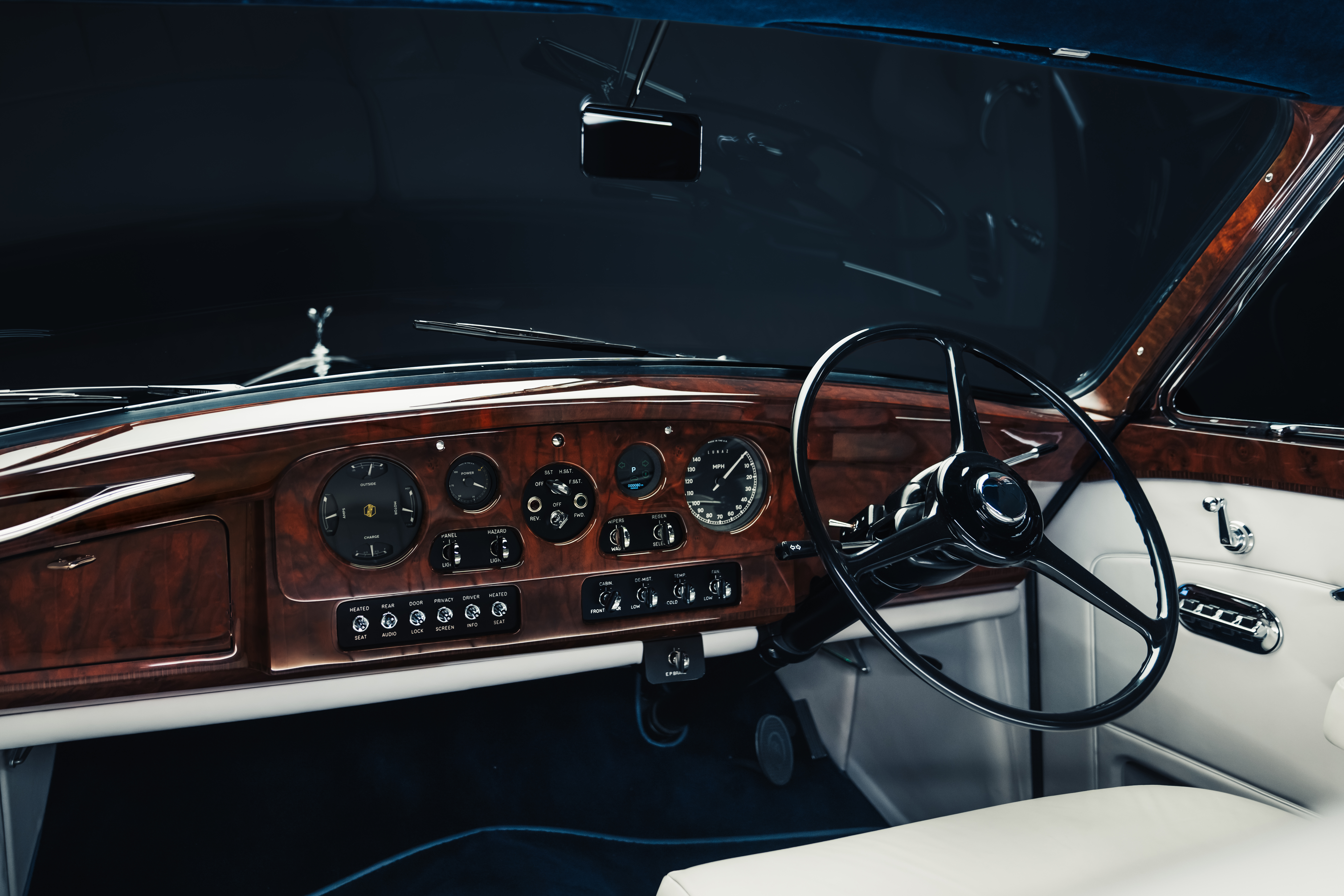 Images of the decadent Phantom V by Lunaz. It is a thing of high quality, looking very vintage with lots of walnut details and original coachwork