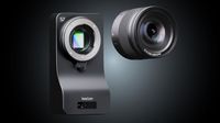 A sleek YoloCam S7 camera body with a vertical sensor, paired with a detachable lens against a dark backdrop