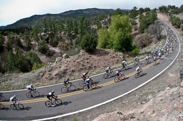 The peloton passes near Lake Roberts and closes in on the Gila Monster.