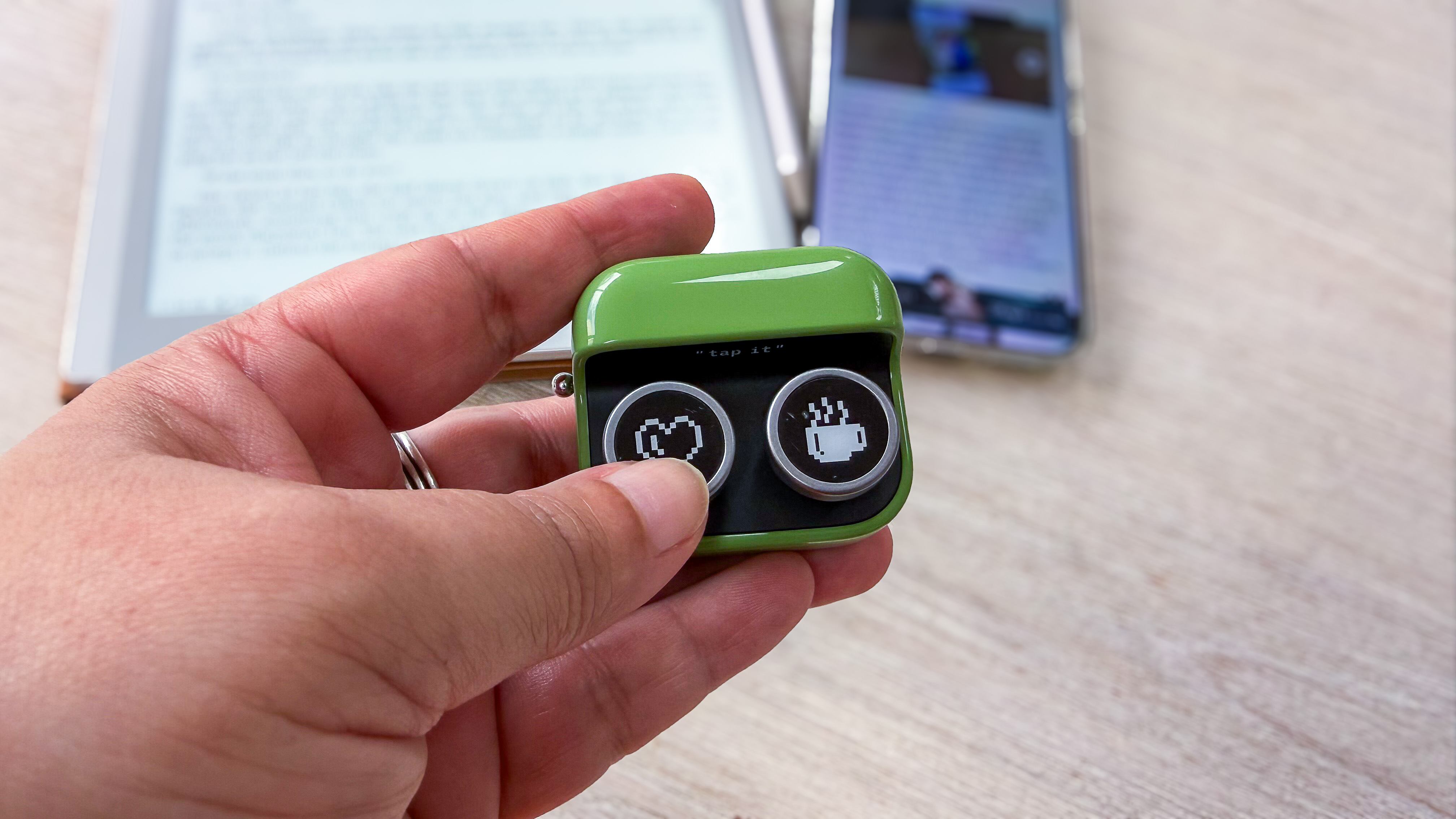 Boox Tappy ereader page turner in a person's hand