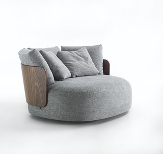 Milan Design Week Porada Calin XL armchair in grey, round shape with wood back rest detail