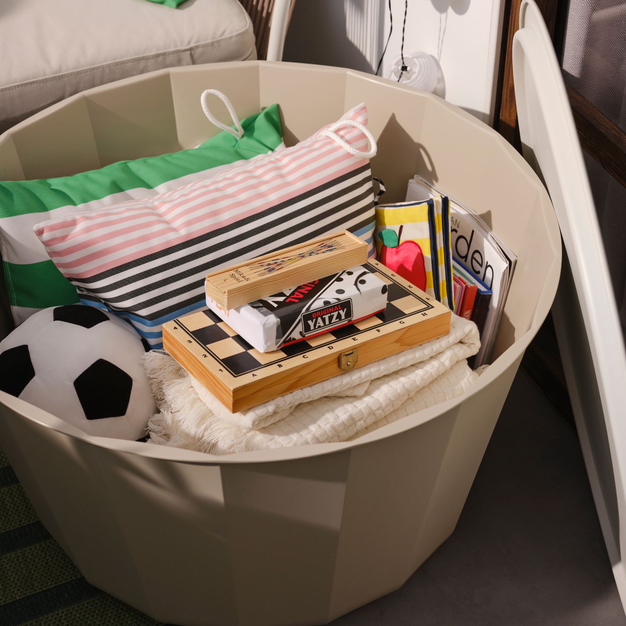 IKEA storage coffee table with toys and cushions inside