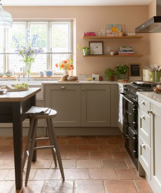 farmhouse kitchen with range cooker and flagstone floor