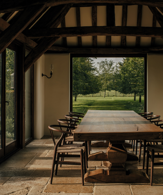 dining room with countryside view through window behind