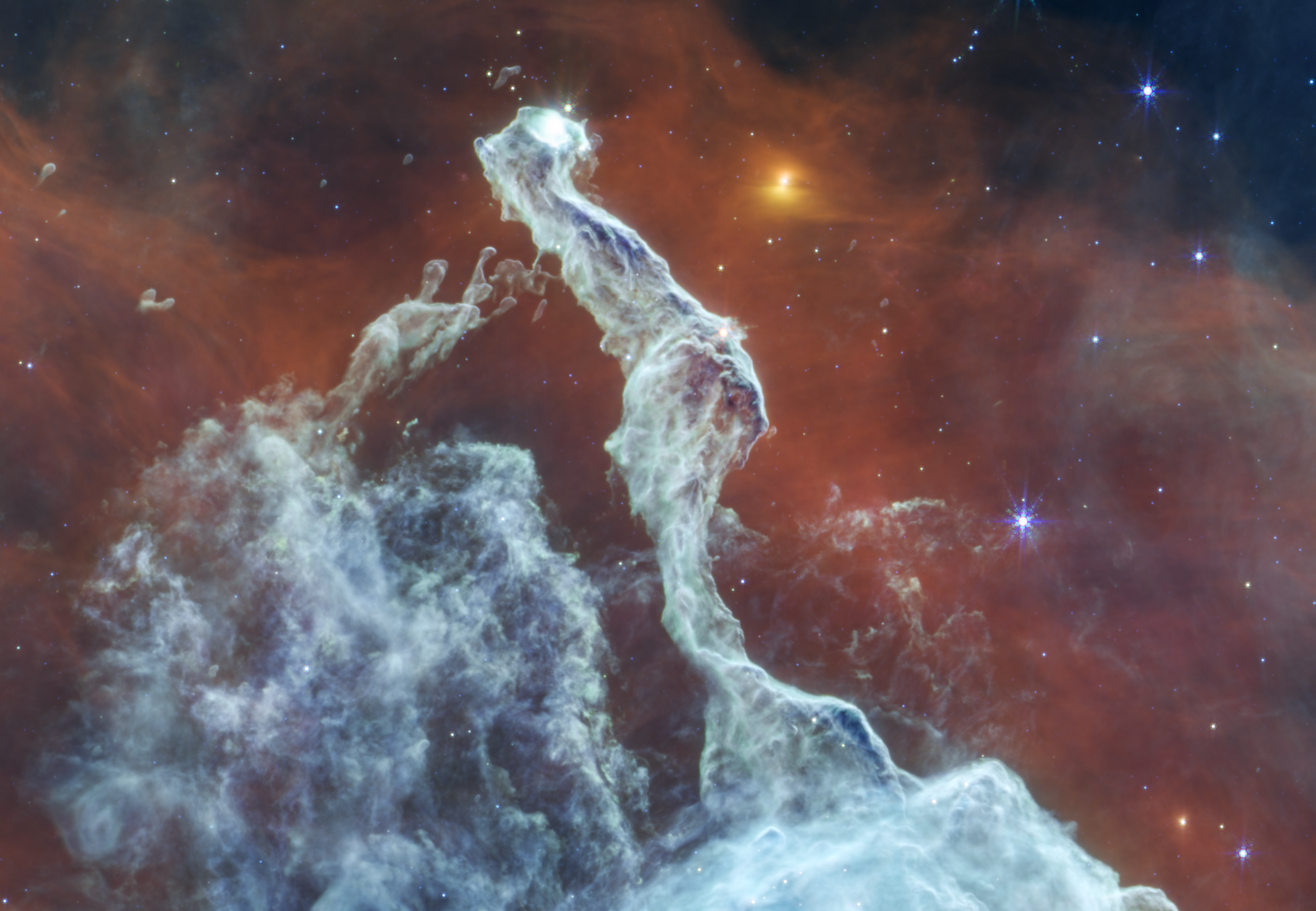 NASA&amp;rsquo;s James Webb Space Telescope&amp;rsquo;s mid-infrared view reveals intricate structures within the nebula, traced by the emission from warm dust and carbon-based molecules excited by starlight.