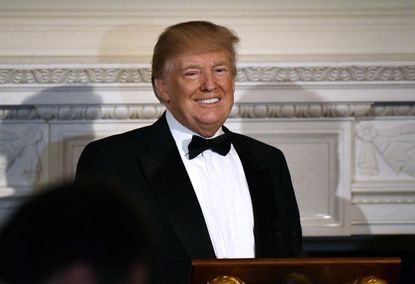 President Donald Trump speaks during the Governors' Ball in the State Dinning Room of the White House on February 25, 2018 in Washington, DC.