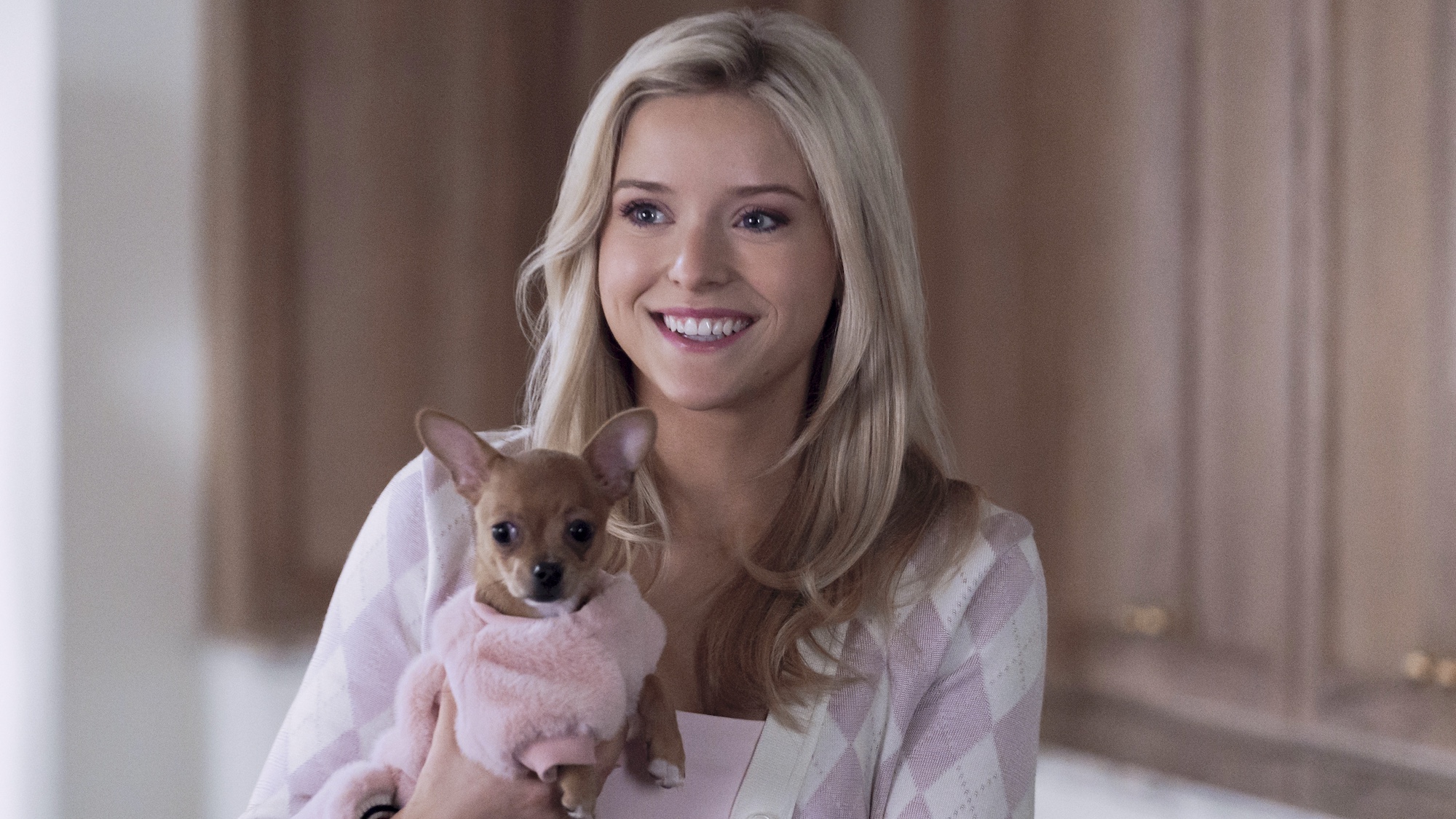 Elle Woods (Lexi Minetree) holding Bruiser in ELLE.