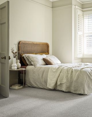 Zen bedroom with cream carpet Kersaint Cobb
