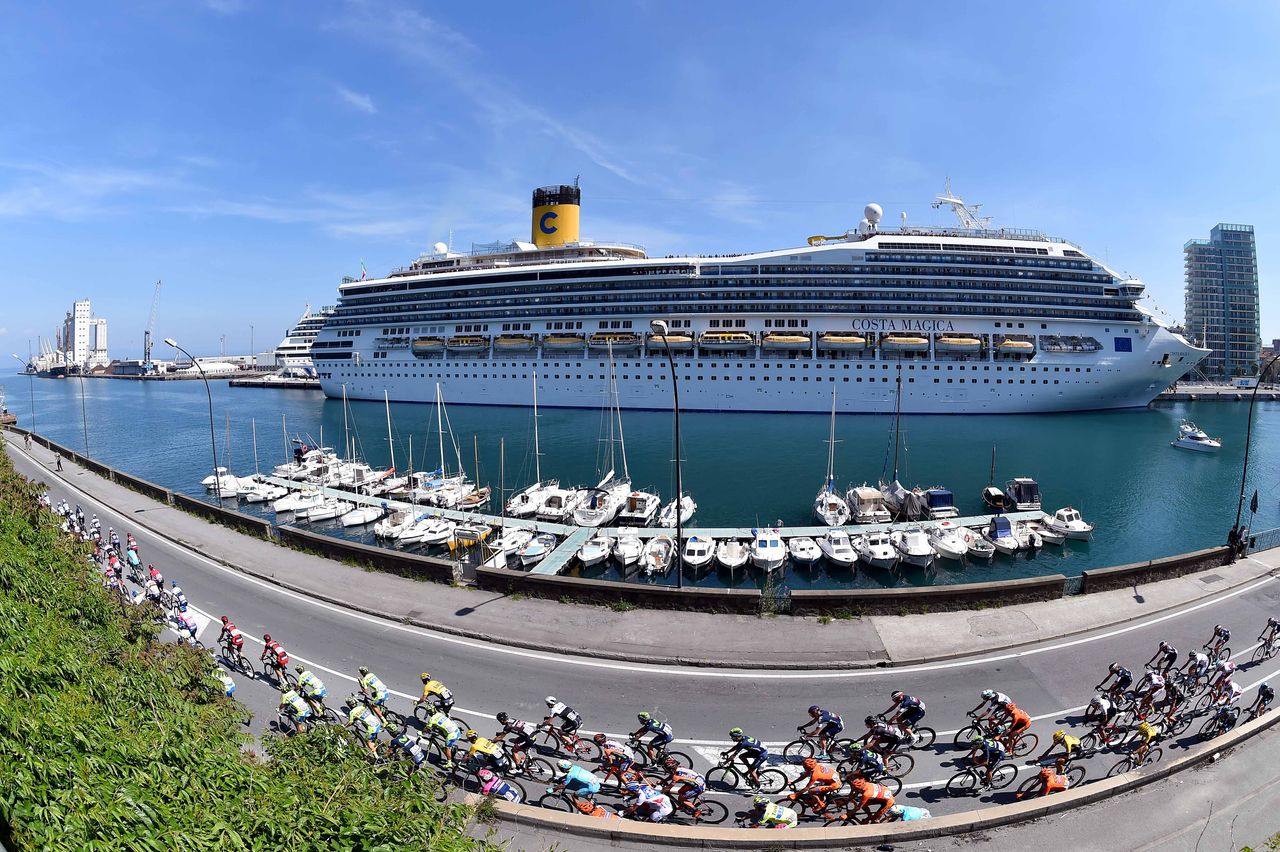 The peloton passes through Savona