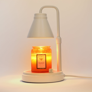 An all-white candle warmer lamp