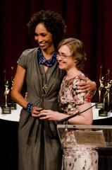 262342-Presenter_Sage_Steele_l_co_host_of_ESPN_s_SportsCenter_presents_the_Wonder_Women_trophy_to_colleague_Lori_LeBas_SVP_strategy_0.jpg