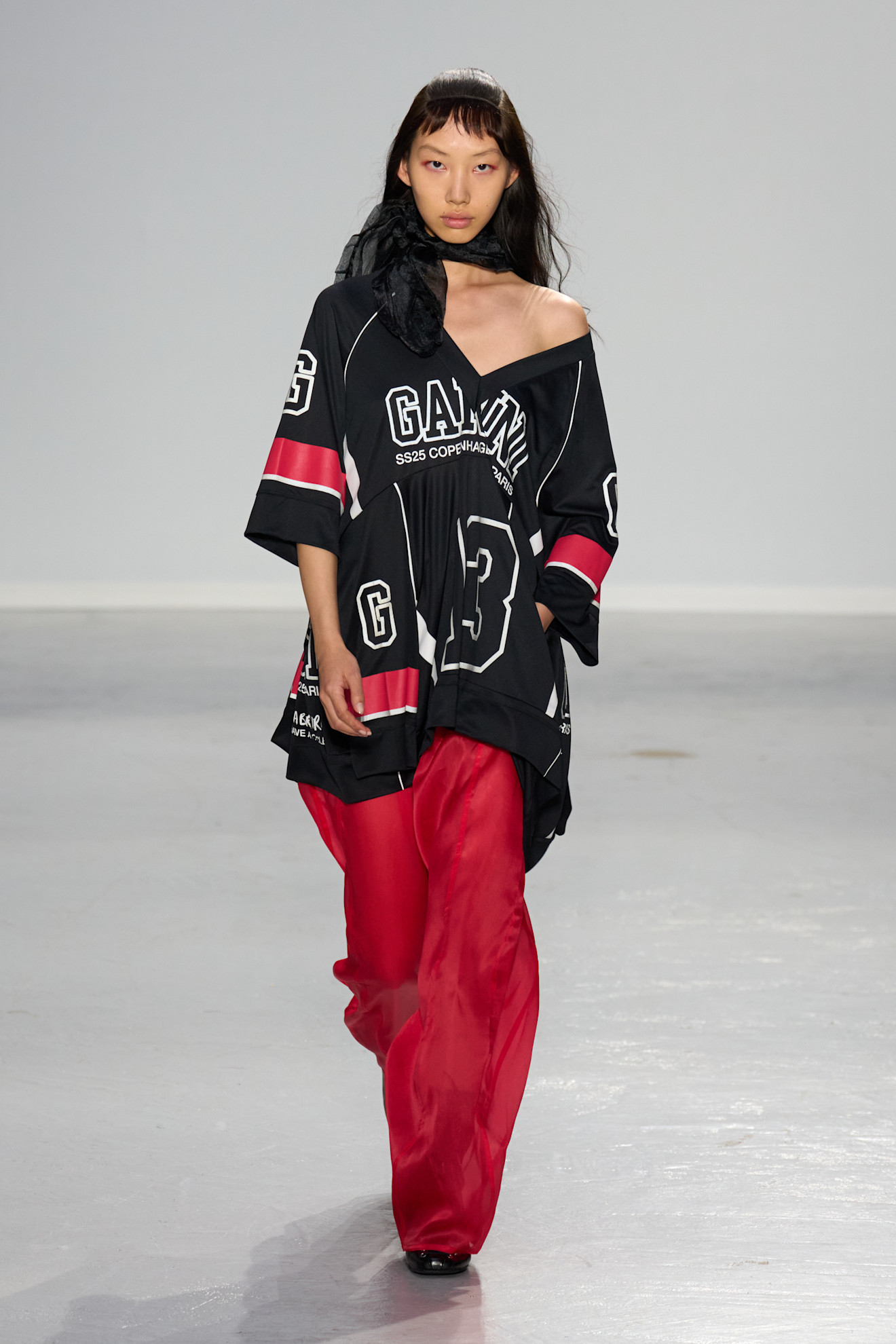 a model wearing the Ganni jersey Taylor Swift would modify for the Chiefs game