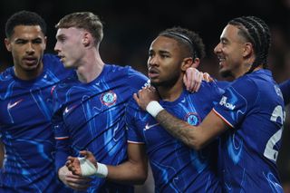 LONDON, ENGLAND - FEBRUARY 25: Chelsea's Christopher Nkunku celebrates scoring his side's first goal with Cole Palmer and Malo Gusto during the Premier League match between Chelsea FC and Southampton FC at Stamford Bridge on February 25, 2025 in London, England. (Photo by Rob Newell - CameraSport via Getty Images)