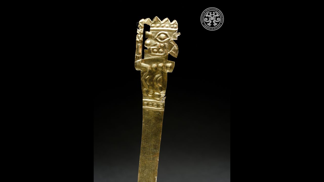 This decoration for a head-dress, made of gold, was found in one of the graves in the tomb. Archaeologists think such finds may signify that only elite craftspeople were buried there.
