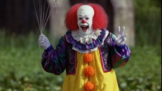 Stephen King's IT 1990 Pennywise The Dancing Clown Tim Curry holding Balloons