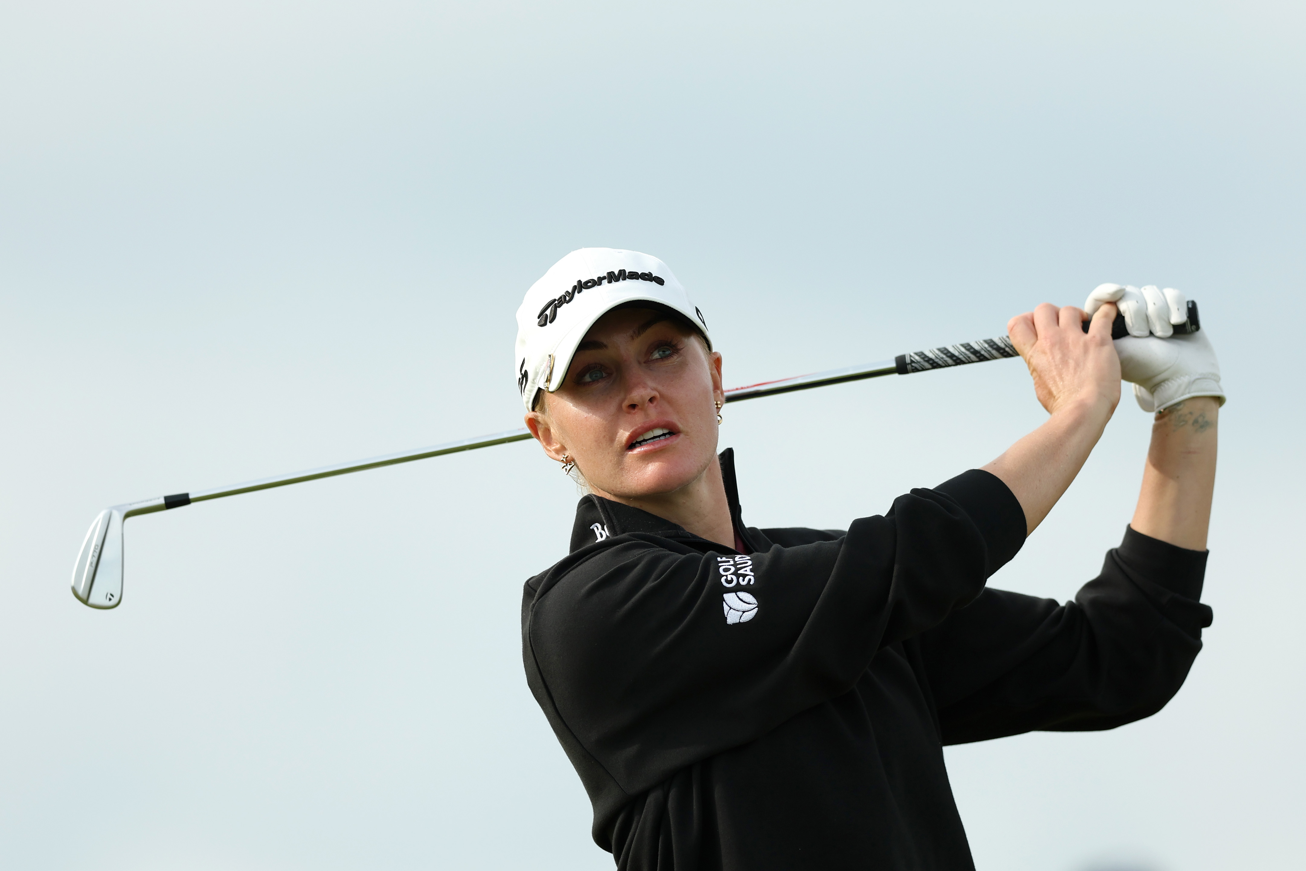Charley Hull hits an iron shot